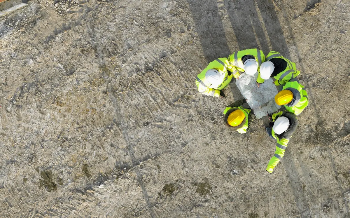 Builders wearing reflective safety jackets